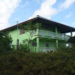Nicaragua villa in Bluefields for sale two-story 6-bedroom home with spectacular bay views in San Pedro