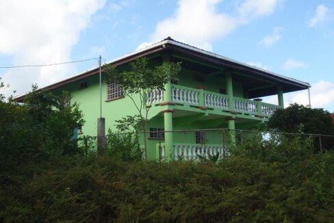 Nicaragua villa in Bluefields for sale two-story 6-bedroom home with spectacular bay views in San Pedro