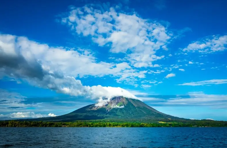 Classic cone of Maderas Volcano rising above Lake Nicaragua