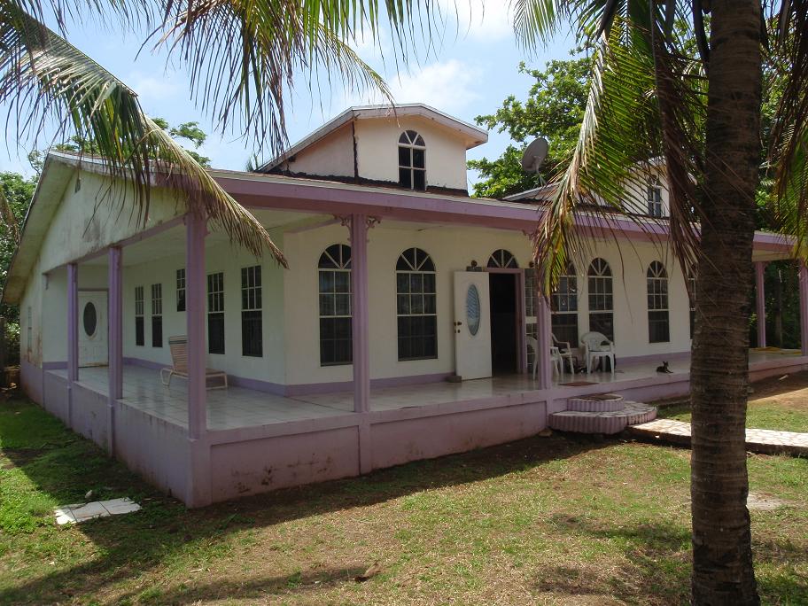 Big Corn Island Oceanfront Home with spacious porches and direct Caribbean Sea views