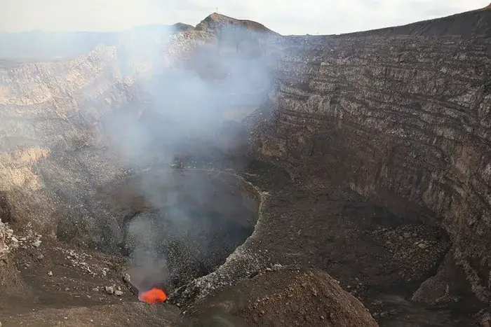 Santiago Crater Volcano active vent with rising gas and rocky walls