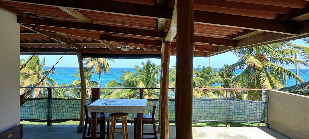Beautiful beachfront home in big corn island real estate with crystal-clear Caribbean waters