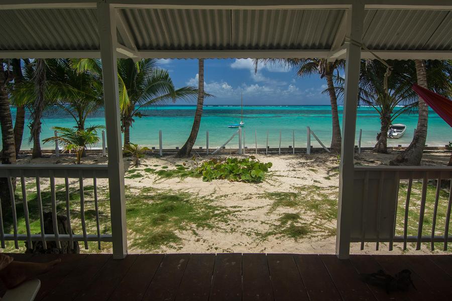 Idyllic little corn island property for sale with white sand beach and turquoise Caribbean waters