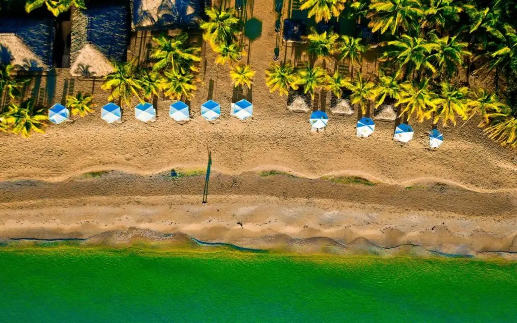 Aerial view of the beach and umbrellas on Corn Islands Nicaragua