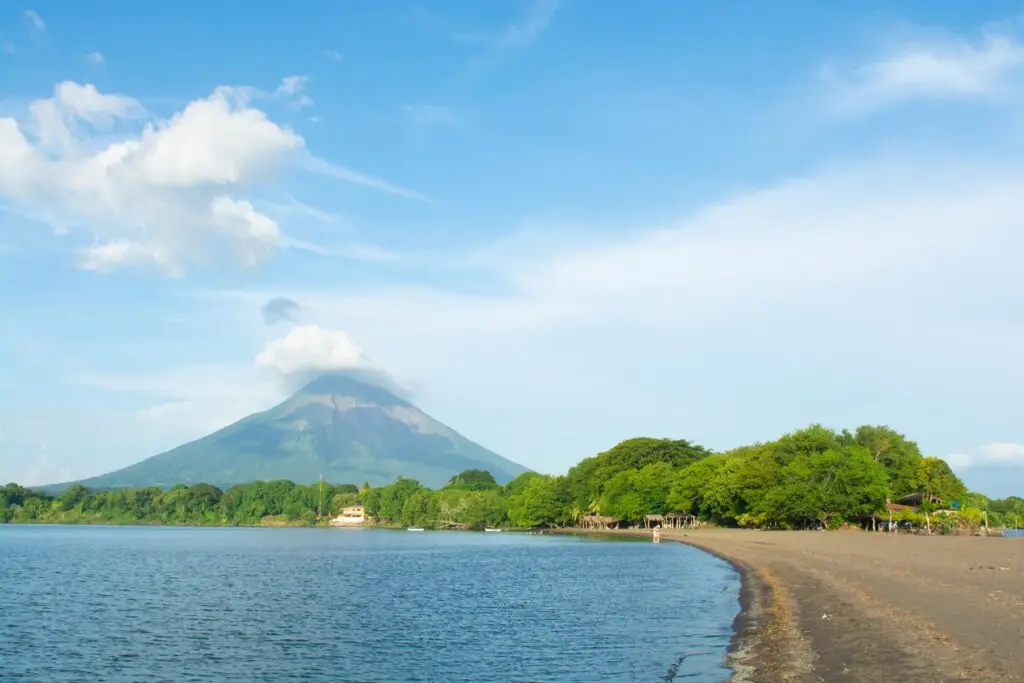 Ometepe Reserve with a Volcano and lake showing why investing in Nicaragua real estate is an investment.