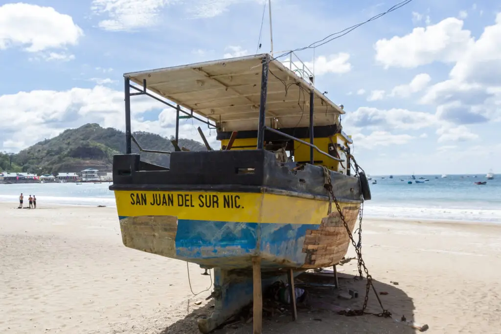 San Juan del Sur, Nicaragua with old wooden boat on the beach